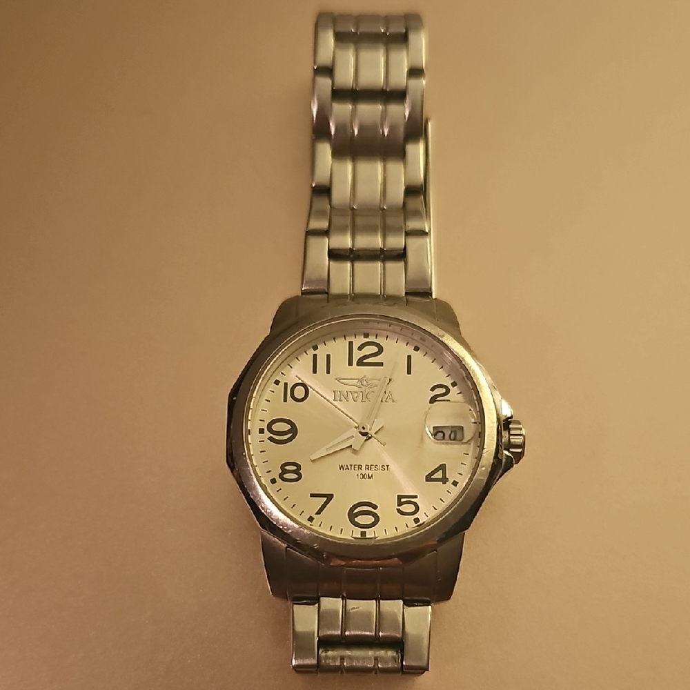 Invicta Silver and White Timepiece